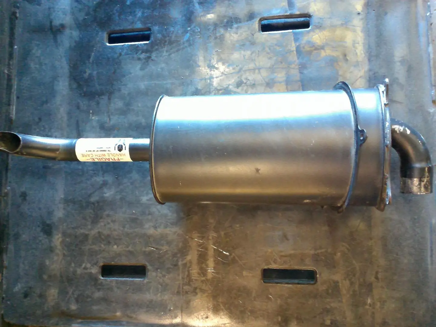 USED MUFFLER image 1