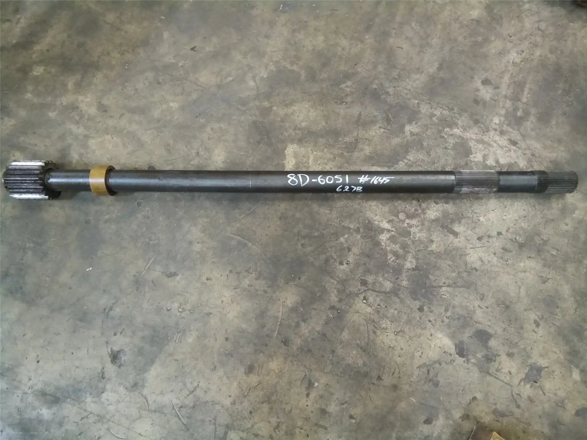 USED AXLE SHAFT indicator image 1