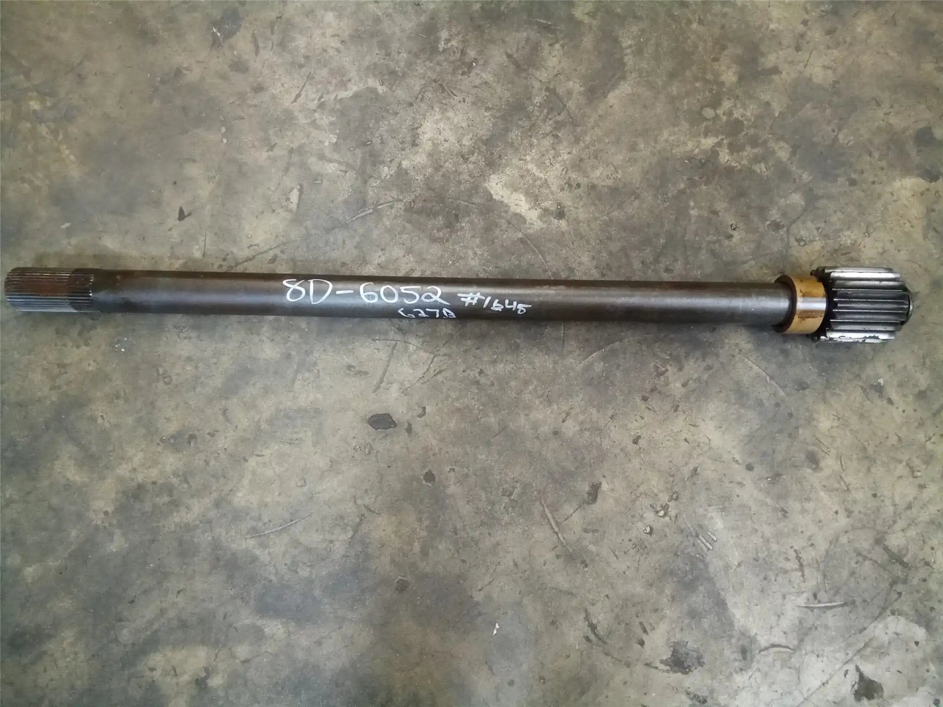 USED AXLE SHAFT indicator image 1